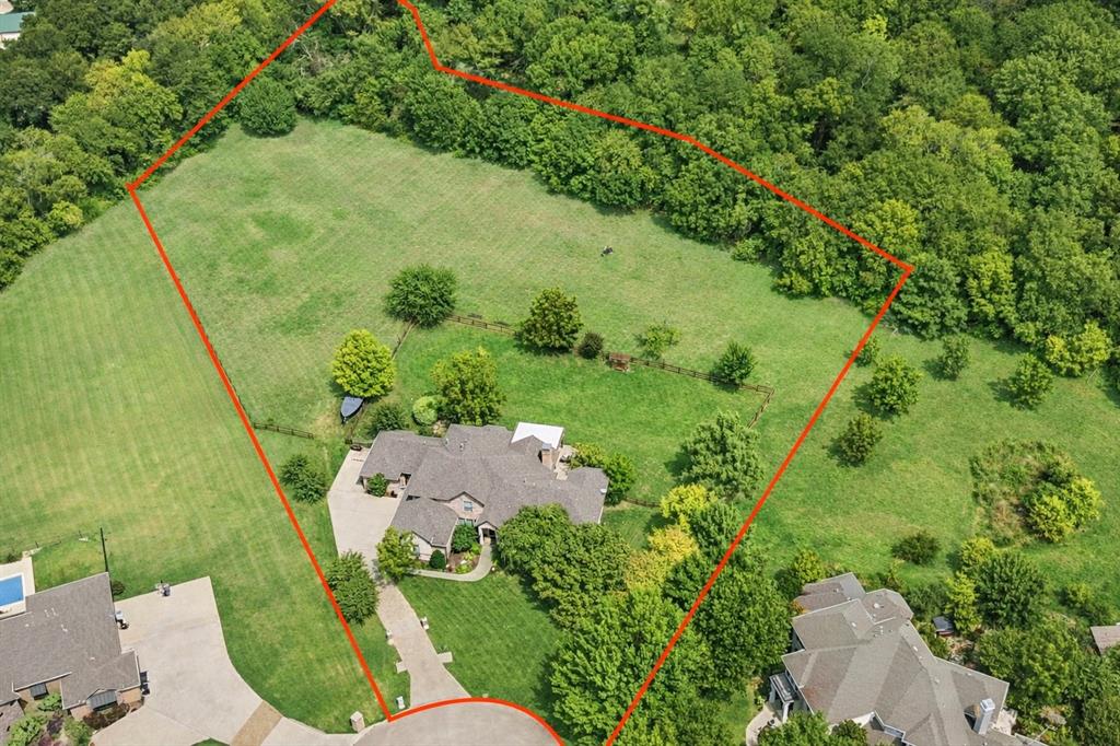 1520 Snider Court Lucas, TX 75002 - Photo 1 of 40 Nestled in the heart of Lucas, this custom home features thoughtful design with standout upgrades and boasts expansive acreage, privacy, and a beautiful blend of open space and mature trees.