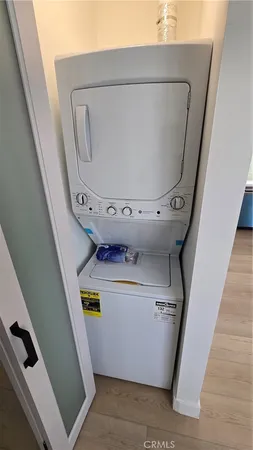 a view of a porch with a table and chairs