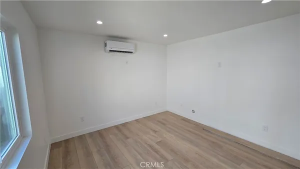 a bathroom with a double vanity sink toilet and shower