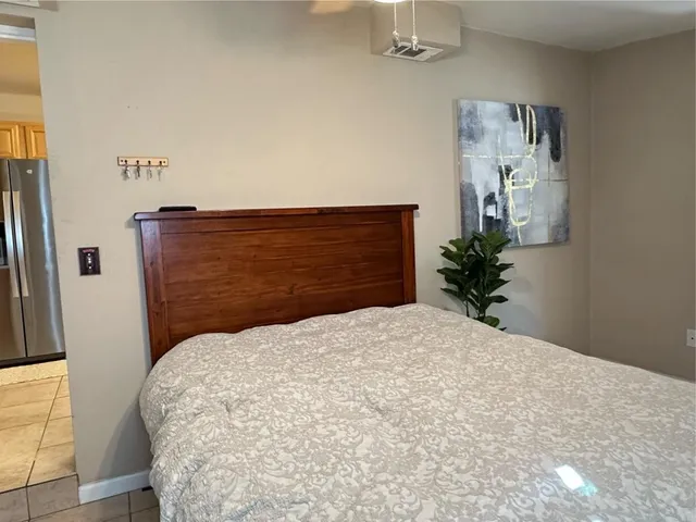 a view of a swimming pool with a lounge chair