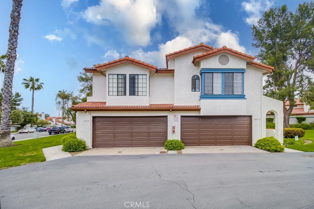 1567 Apache Drive, Unit A Chula Vista, CA 91910 - Photo 2 of 51 a front view of a house with a yard and garage