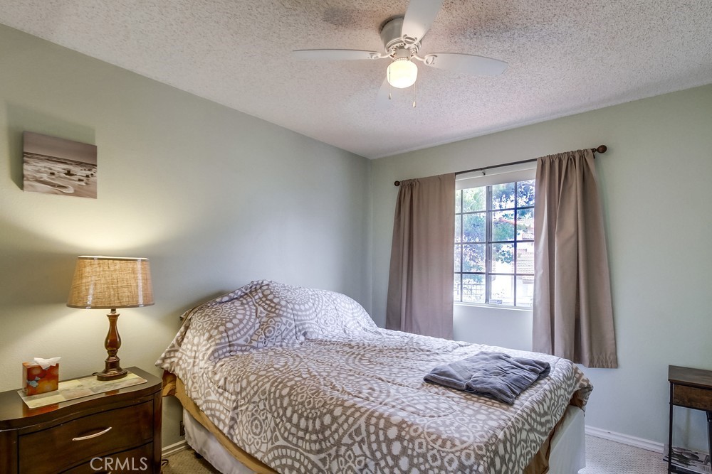 1567 Apache Drive, Unit A Chula Vista, CA 91910 - Photo 23 of 51 a bedroom with a bed and a window