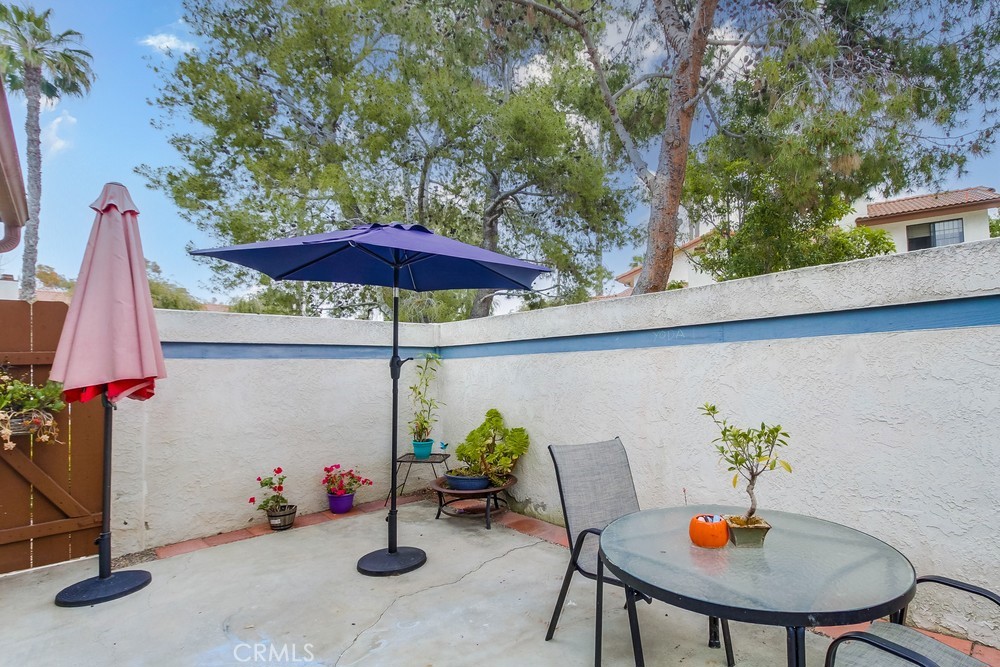1567 Apache Drive, Unit A Chula Vista, CA 91910 - Photo 29 of 51 a backyard with a table and chairs