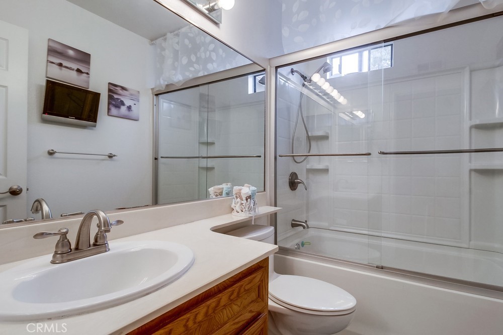 1567 Apache Drive, Unit A Chula Vista, CA 91910 - Photo 32 of 51 a bathroom with a sink toilet and shower