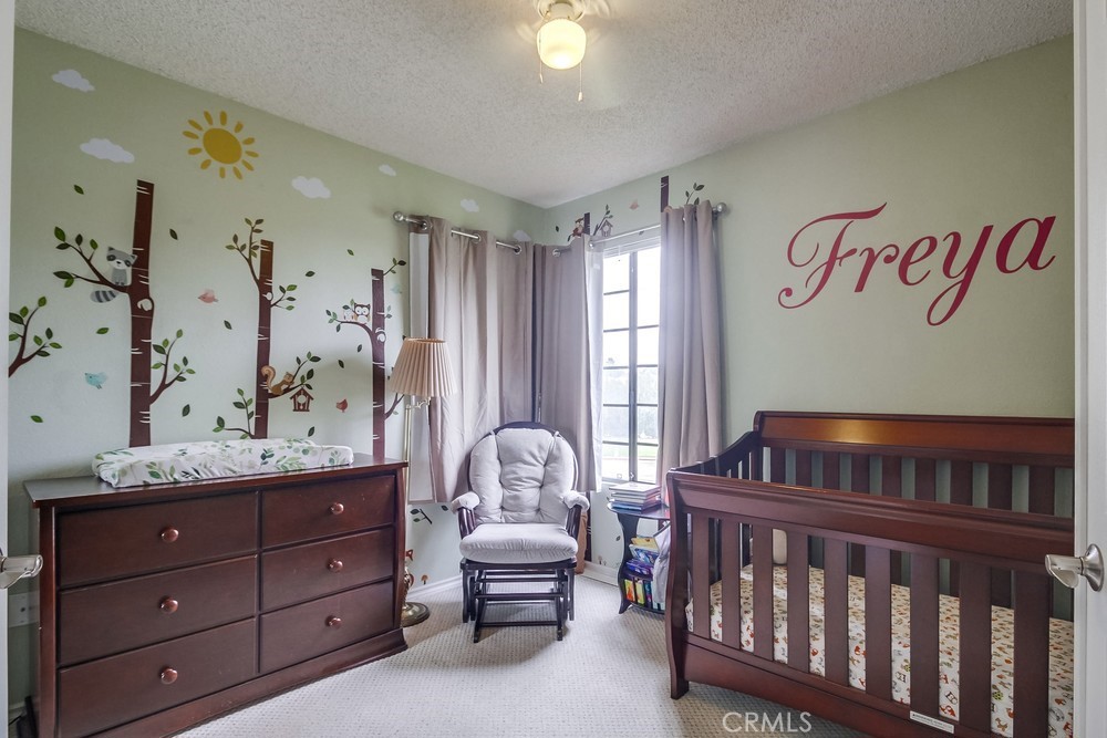 1567 Apache Drive, Unit A Chula Vista, CA 91910 - Photo 33 of 51 a bedroom with furniture and a window