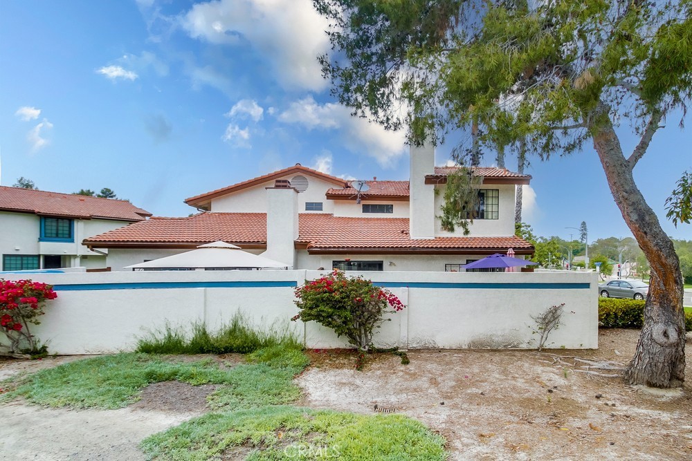 1567 Apache Drive, Unit A Chula Vista, CA 91910 - Photo 37 of 51 a small garden in the backyard of a house