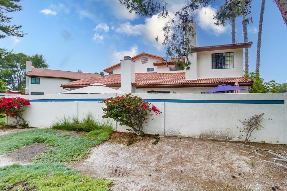 1567 Apache Drive, Unit A Chula Vista, CA 91910 - Photo 38 of 51 a front view of a house with a garage