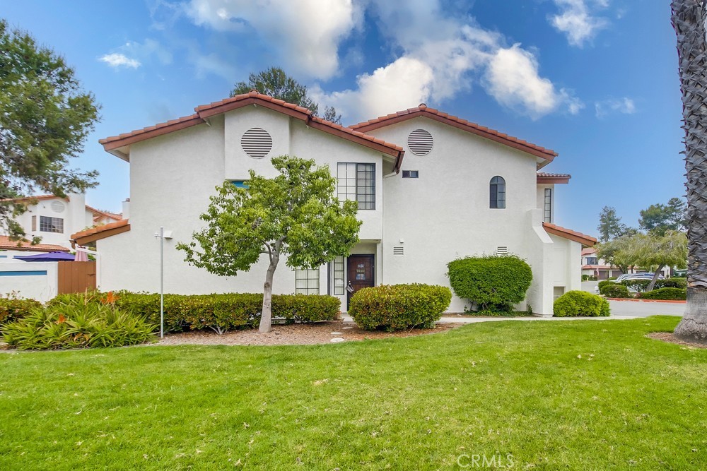1567 Apache Drive, Unit A Chula Vista, CA 91910 - Photo 4 of 51 a view of a house with a yard and plants