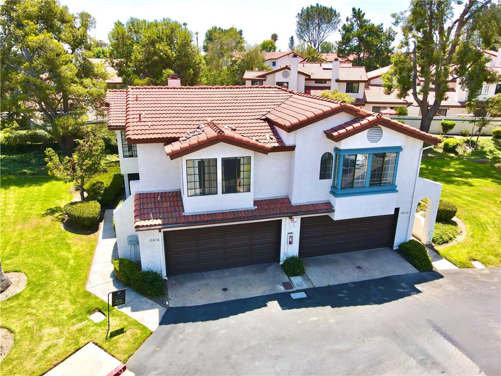 1567 Apache Drive, Unit A Chula Vista, CA 91910 - Photo 45 of 51 a front view of a house with a garden