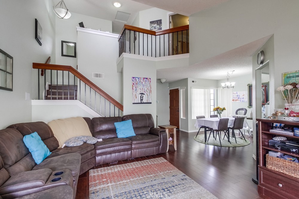 1567 Apache Drive, Unit A Chula Vista, CA 91910 - Photo 7 of 51 a living room with furniture and wooden floor
