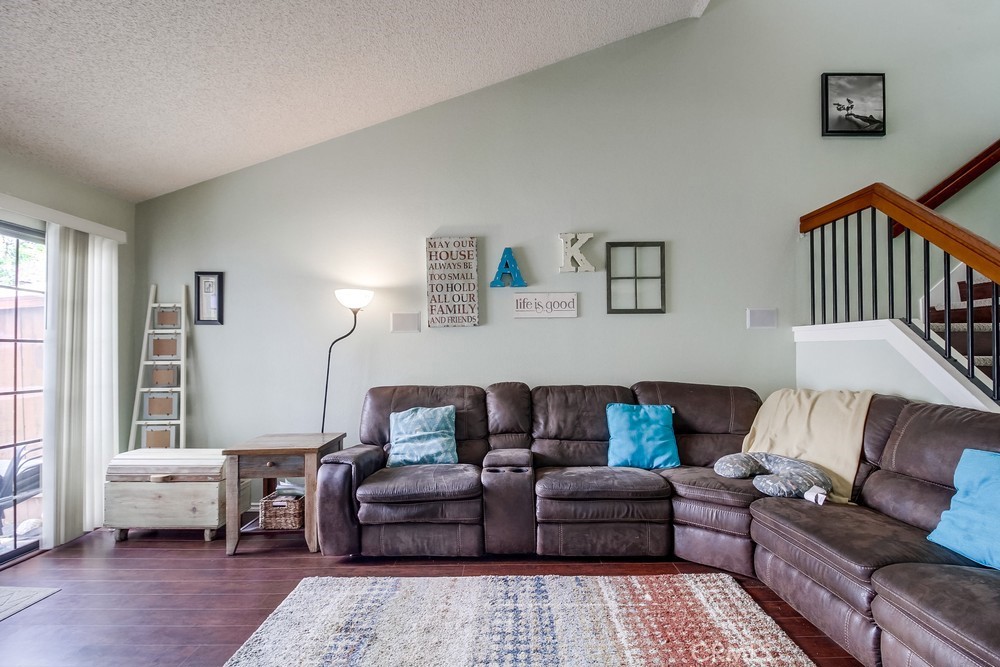 1567 Apache Drive, Unit A Chula Vista, CA 91910 - Photo 8 of 51 a living room with furniture and a couch