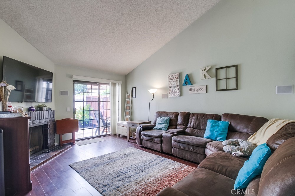 1567 Apache Drive, Unit A Chula Vista, CA 91910 - Photo 9 of 51 a living room with furniture and a couch