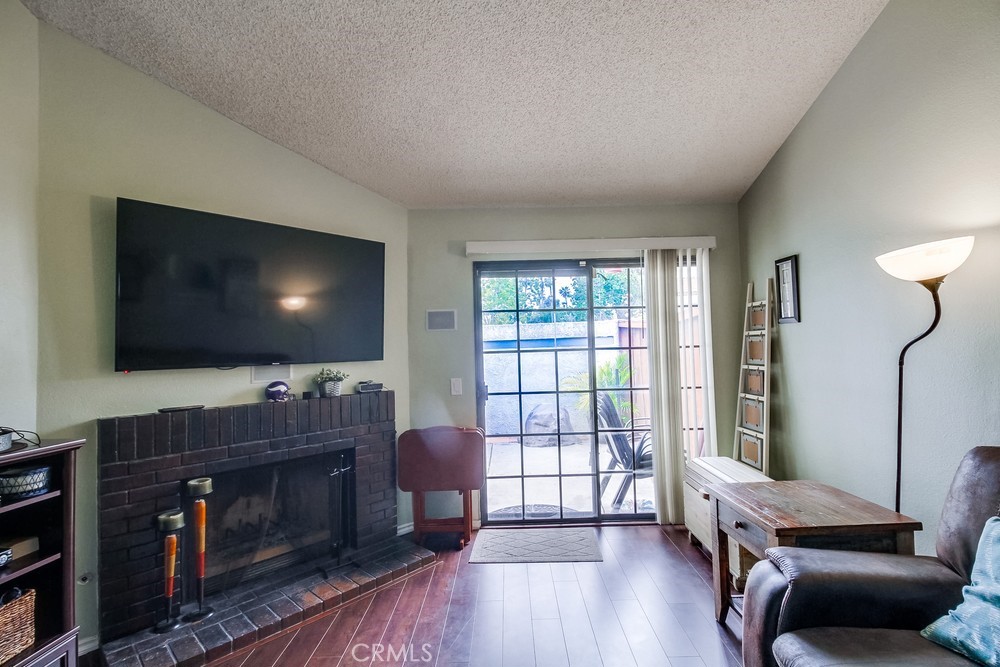 1567 Apache Drive, Unit A Chula Vista, CA 91910 - Photo 10 of 51 a living room with furniture and a flat screen tv