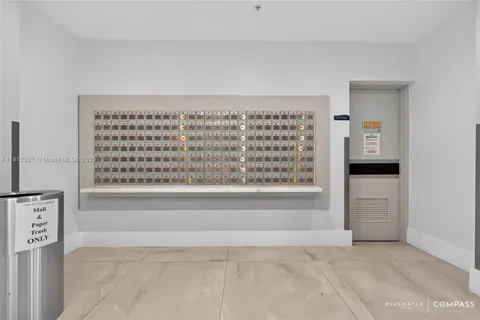 a view of kitchen with cabinet and window