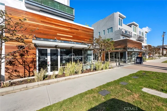 front view of a building with a yard