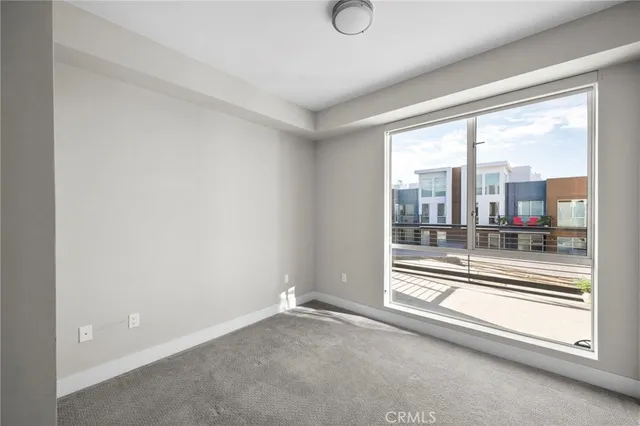 a view of a room with a large window