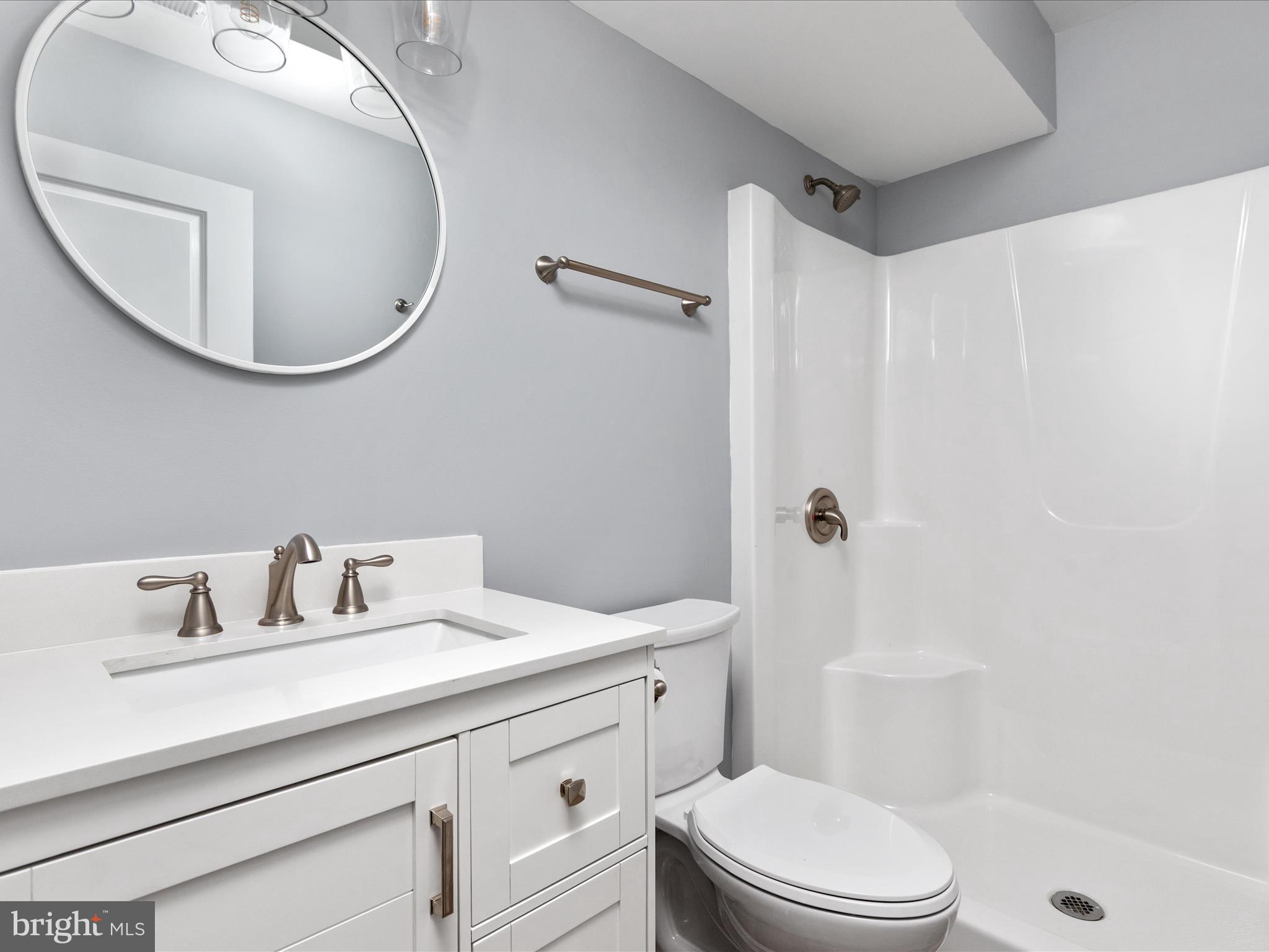 178 Bank Street Mount Jackson, VA 22842 - Photo 14 of 22 a bathroom with a sink a toilet and a mirror