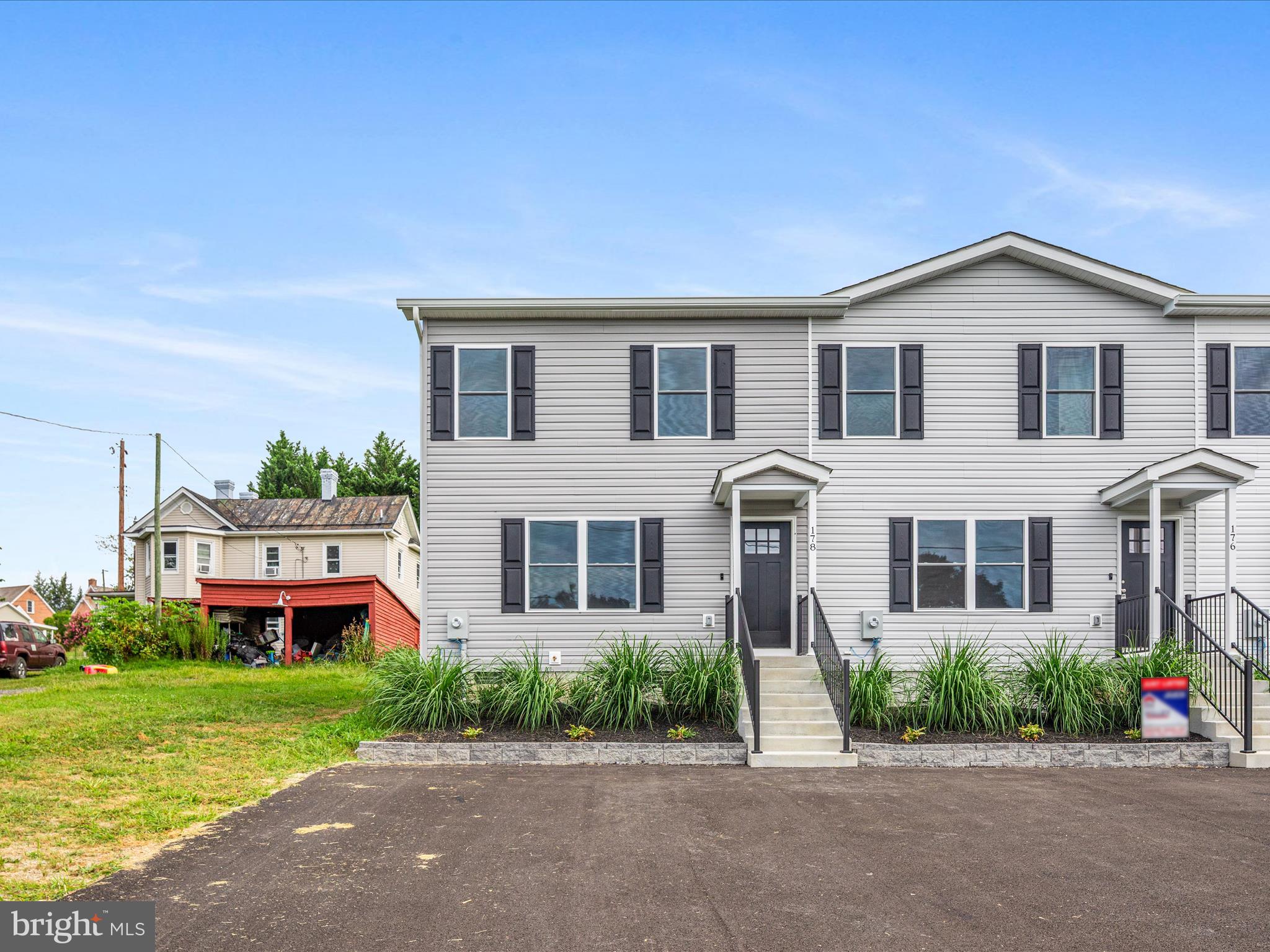 178 Bank Street Mount Jackson, VA 22842 - Photo 3 of 22 a front view of house with yard and green space