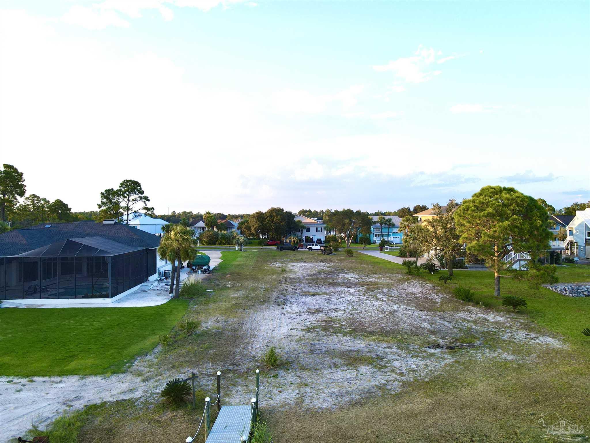 7809 Petersen Point Road Milton, FL 32583 - Photo 14 of 33 a view of a road with a building in the background