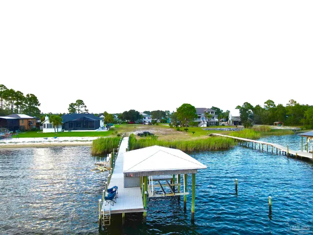 a view of a balcony with two chairs