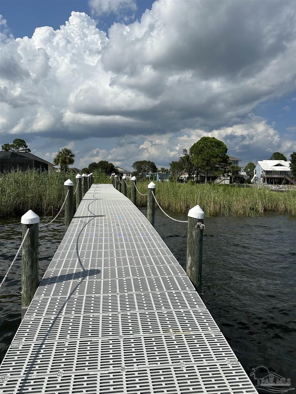 7809 Petersen Point Road Milton, FL 32583 - Photo 22 of 33 a view of a terrace with sitting area