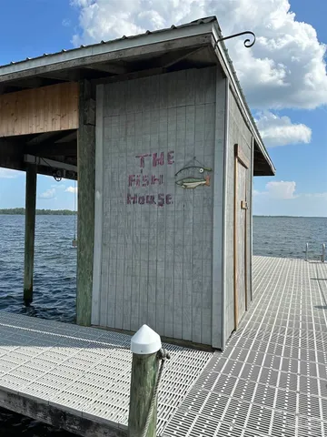 a spacious bathroom with a tub and a sink