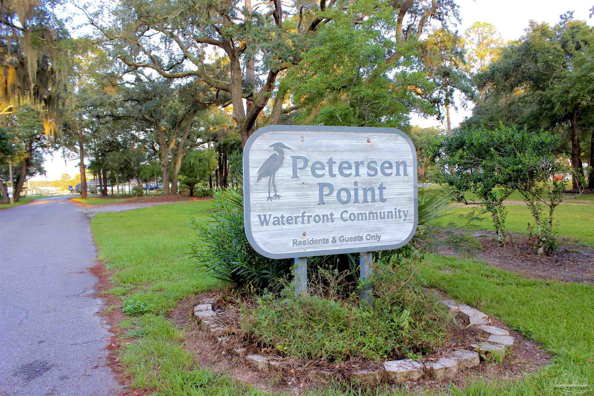 7809 Petersen Point Road Milton, FL 32583 - Photo 27 of 33 a view of a park with large trees