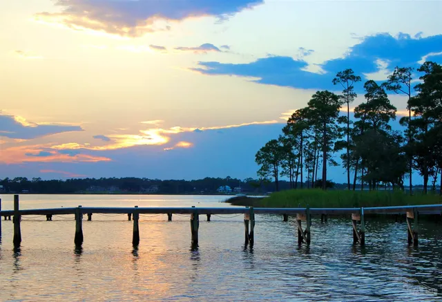 a view of swimming pool with outdoor seating