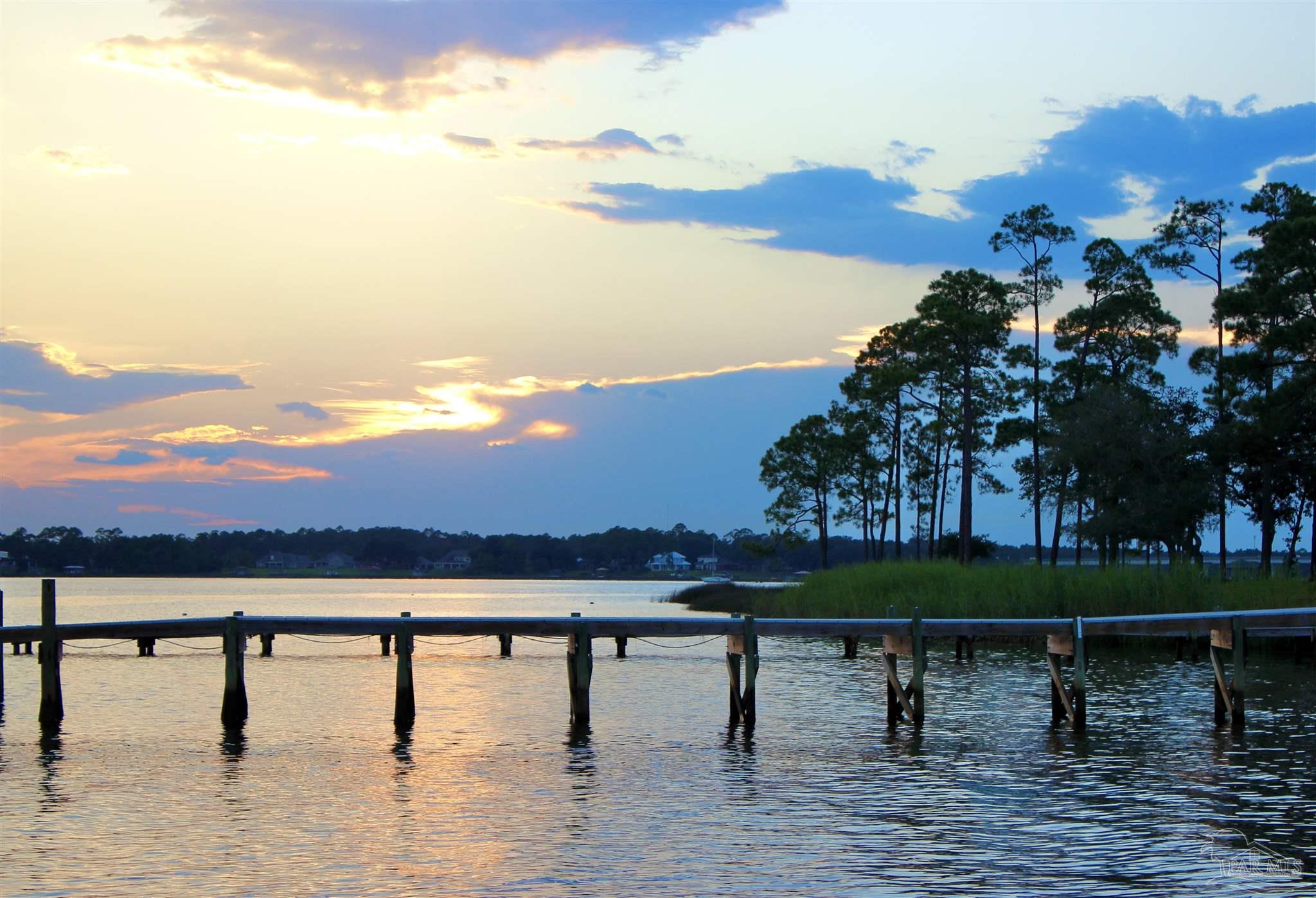 7809 Petersen Point Road Milton, FL 32583 - Photo 9 of 33 a view of lake with mountain view