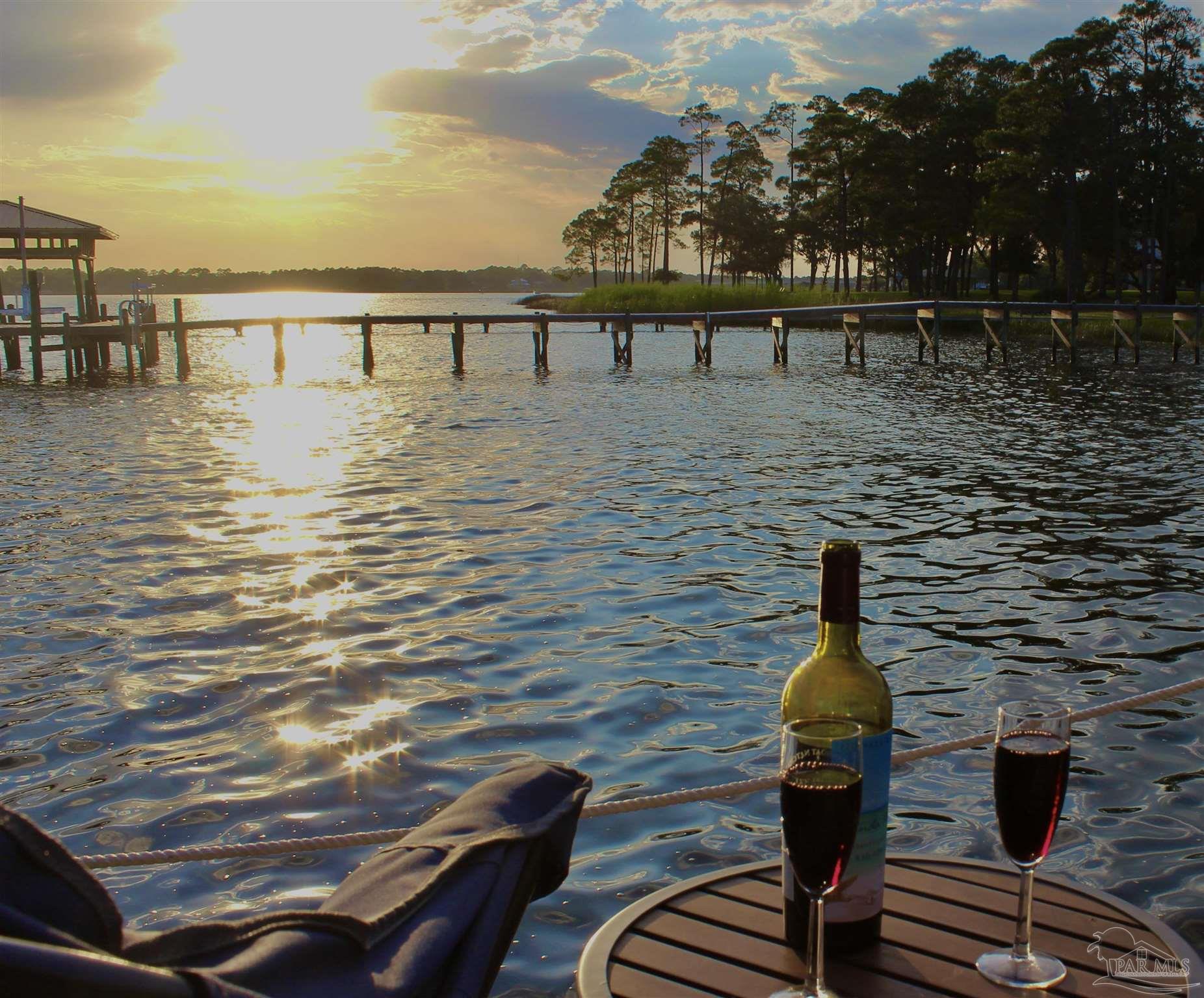 7809 Petersen Point Road Milton, FL 32583 - Photo 10 of 33 a view of swimming pool with outdoor seating