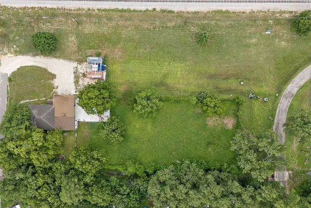 a view of a house with a big yard