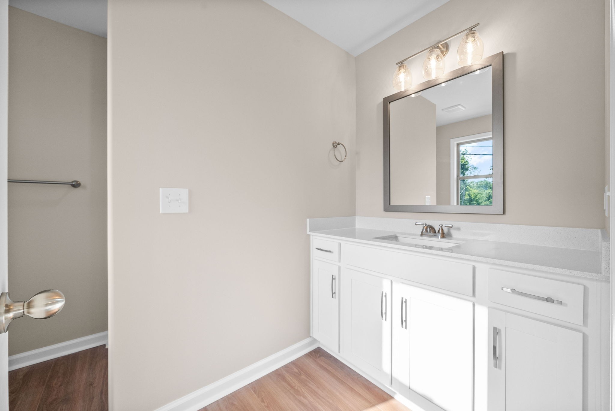 102 Colson Road Dover, TN 37058 - Photo 13 of 21 a bathroom with a sink a light fixture and a mirror