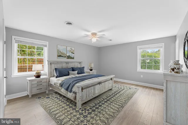 a bed room with a bed and a window