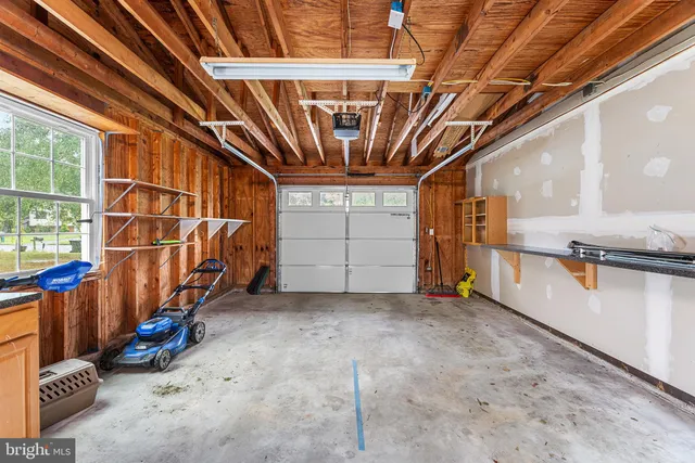 a view of a garage room with staircase