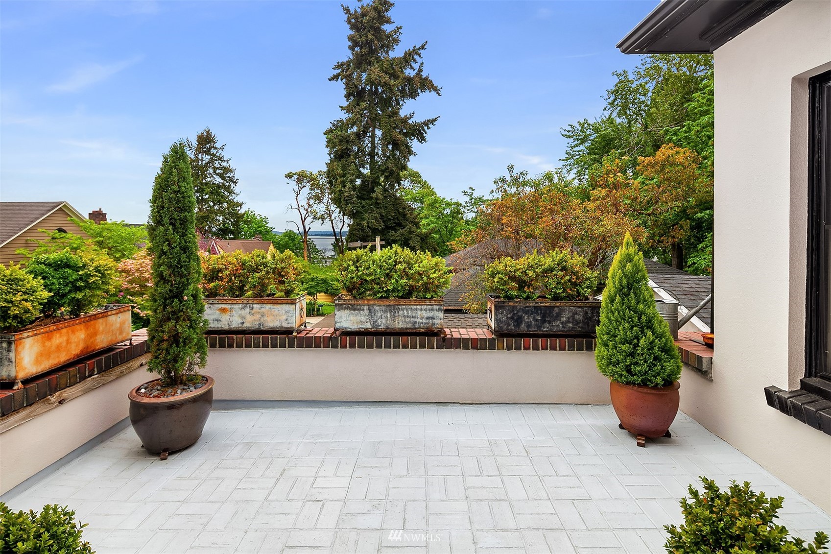 3915 East Pine Street Seattle, WA 98122 - Photo 5 of 32 a view of a garden with potted plants