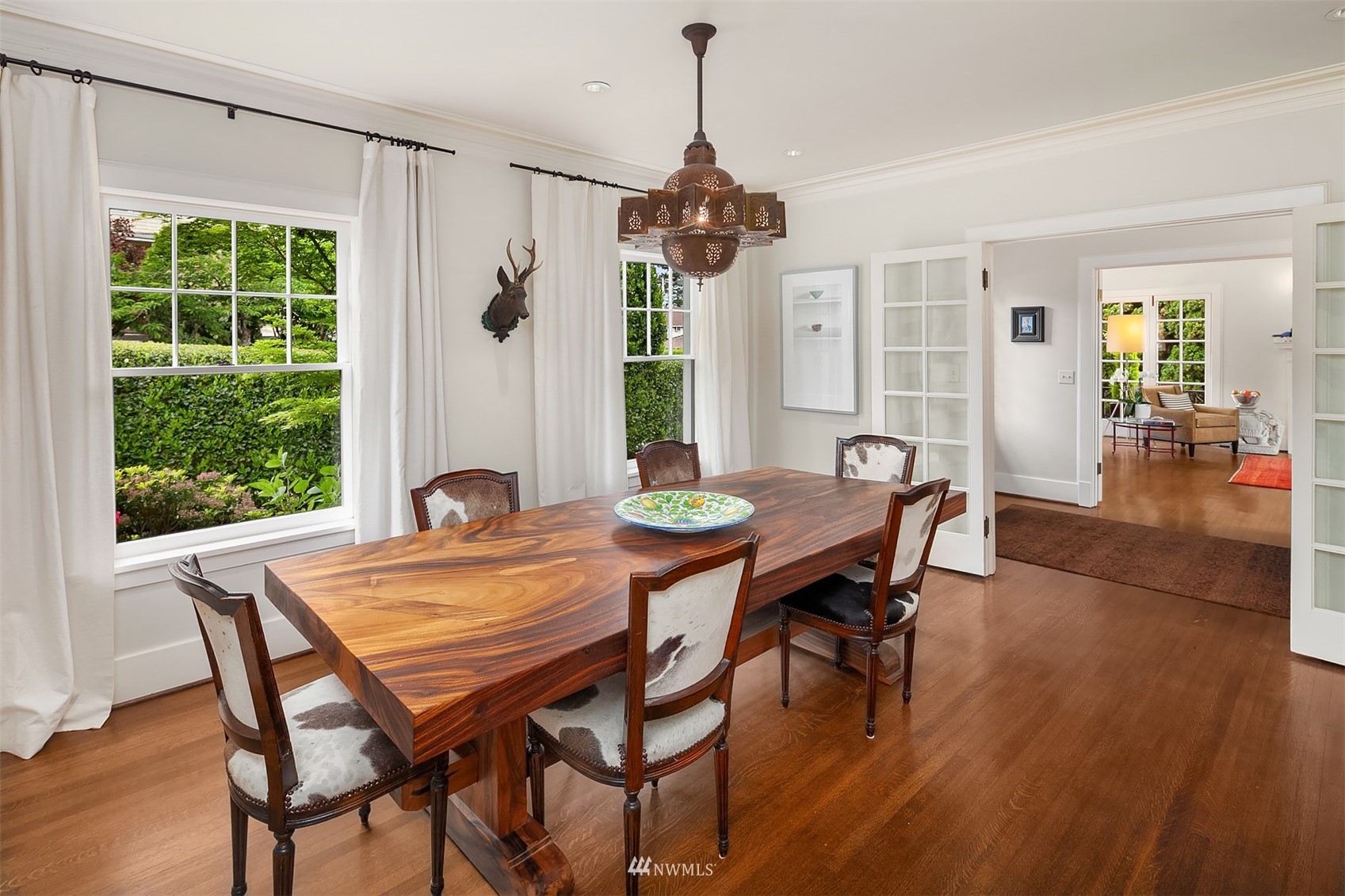 3915 East Pine Street Seattle, WA 98122 - Photo 10 of 32 a view of a dining room with furniture window and wooden floor
