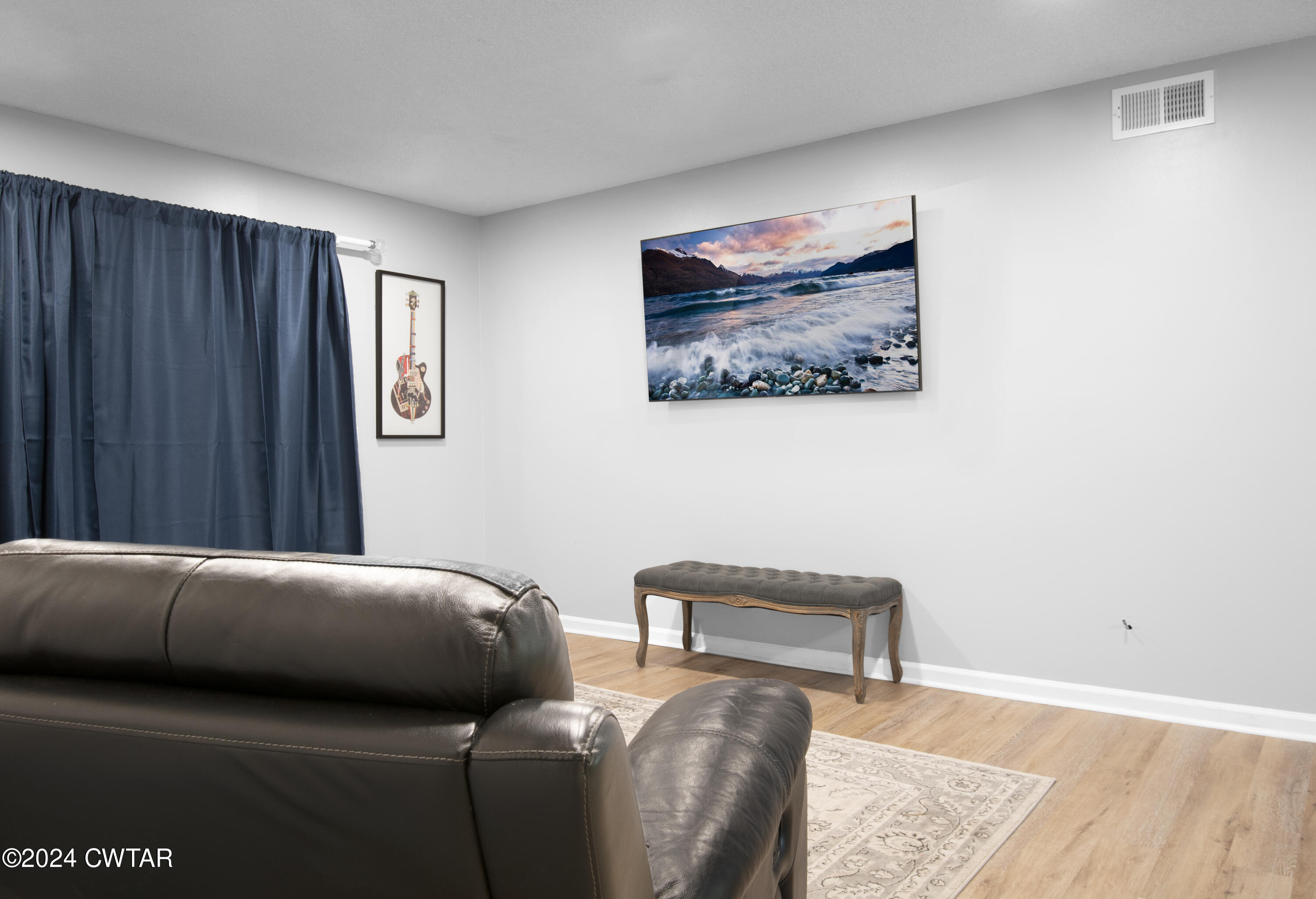 500 Paragon Mills Road Nashville, TN 37211 - Photo 2 of 14 a bedroom with a bed and a couch