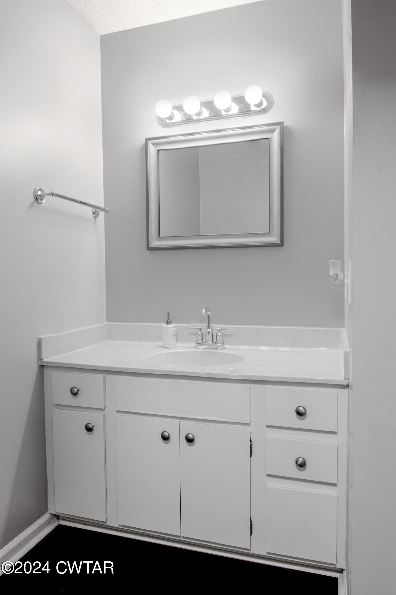 500 Paragon Mills Road Nashville, TN 37211 - Photo 9 of 14 a bathroom with a sink vanity and mirror