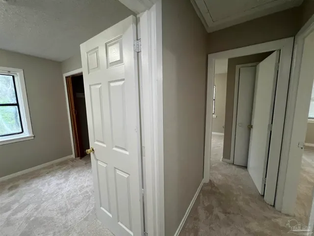 a view of hallway with window