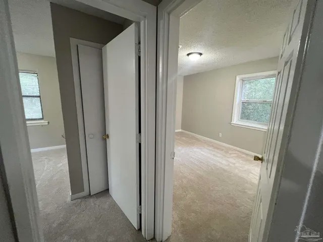 a bathroom with a sink toilet and mirror