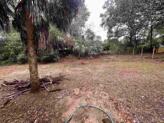 a view of storage and utility room with a window
