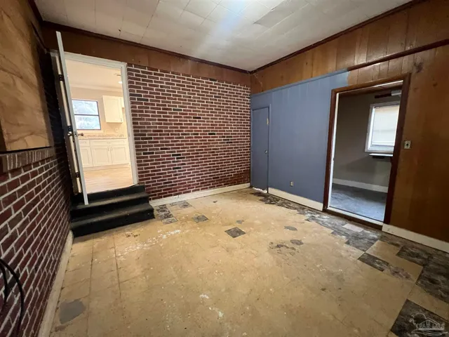 a view of backyard and tree