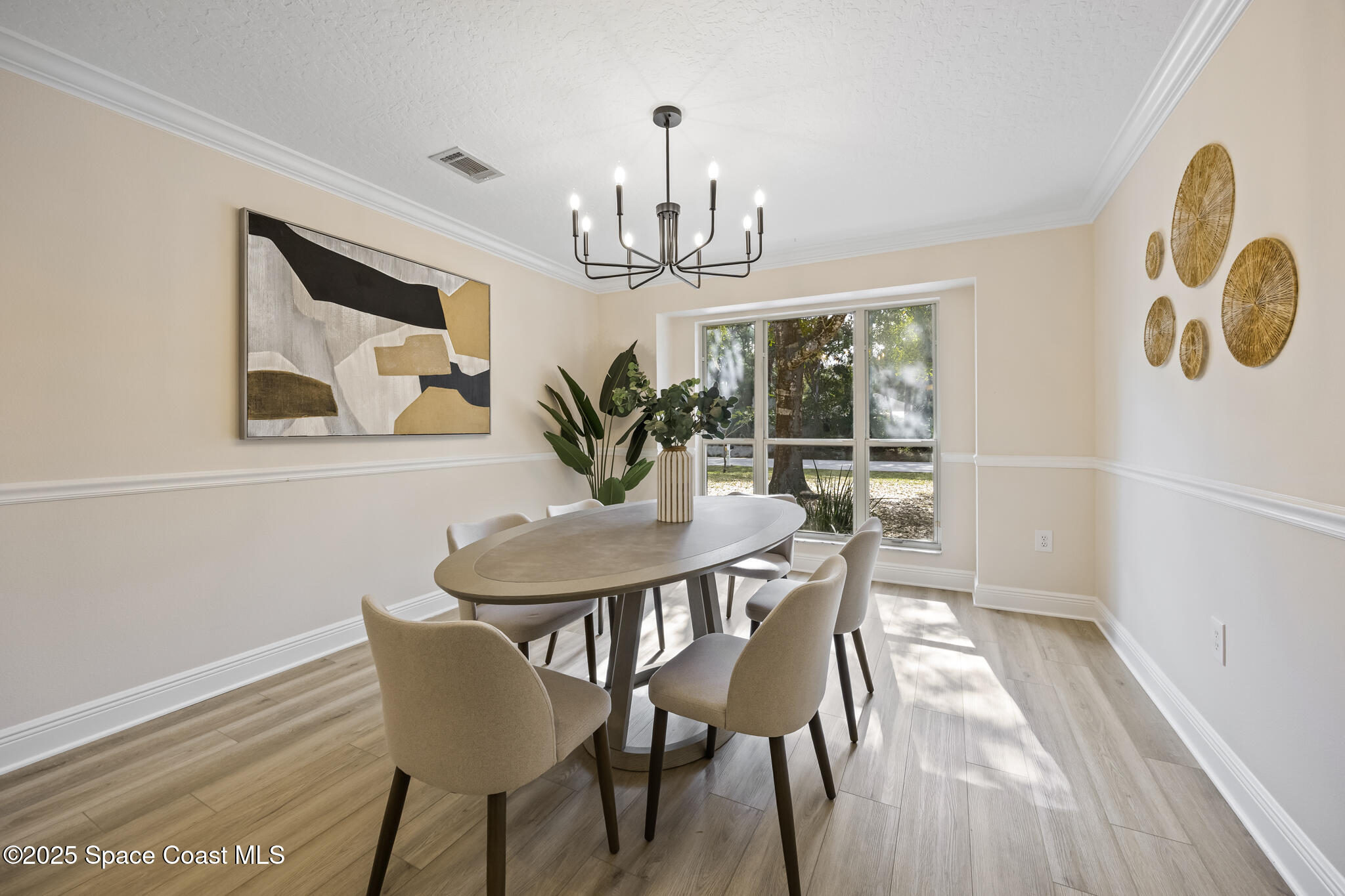 2190 Winston Drive Cocoa, FL 32926 - Photo 19 of 59 a view of a dining room with furniture window and wooden floor