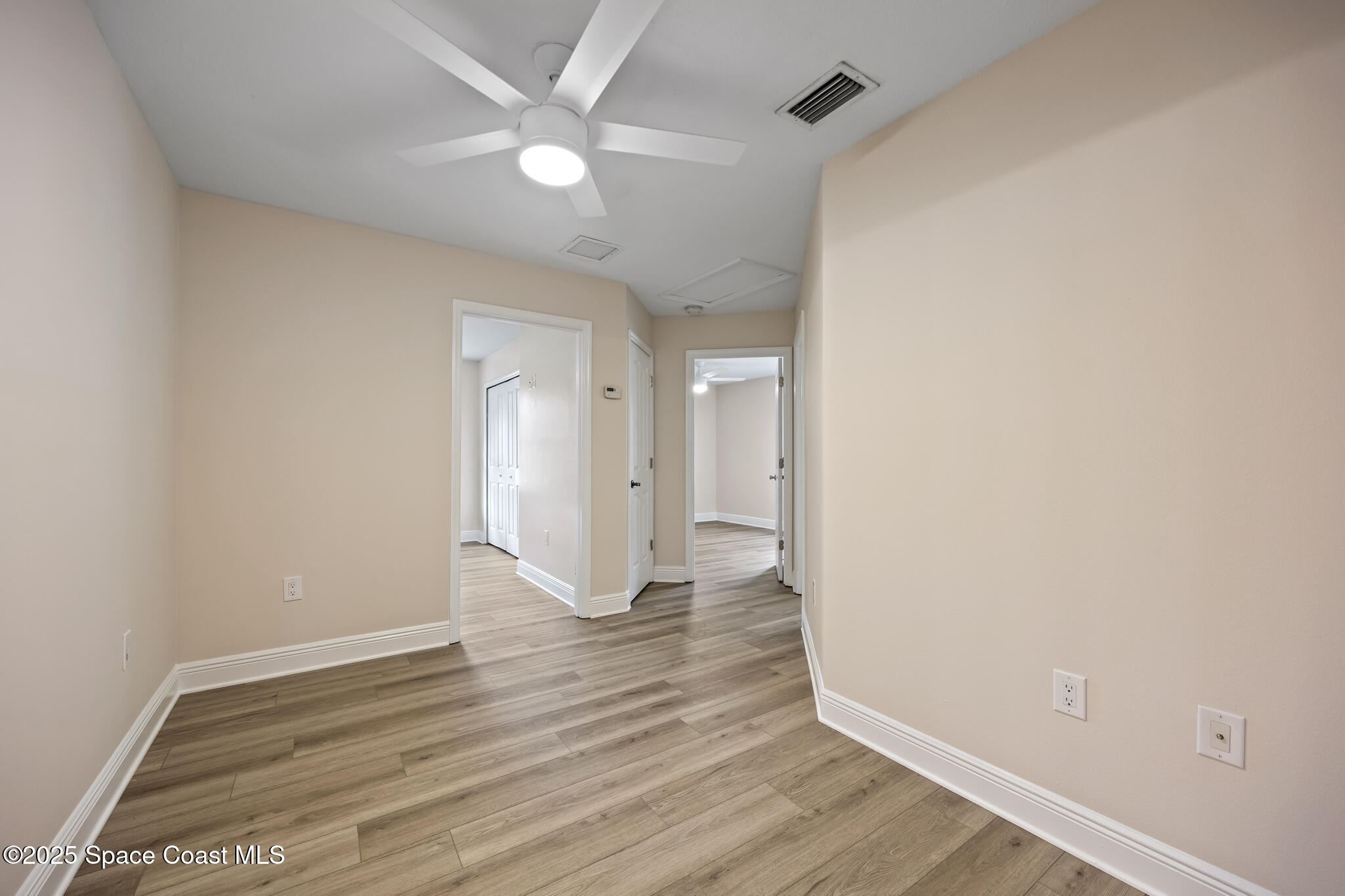 2190 Winston Drive Cocoa, FL 32926 - Photo 29 of 59 wooden floor in an empty room