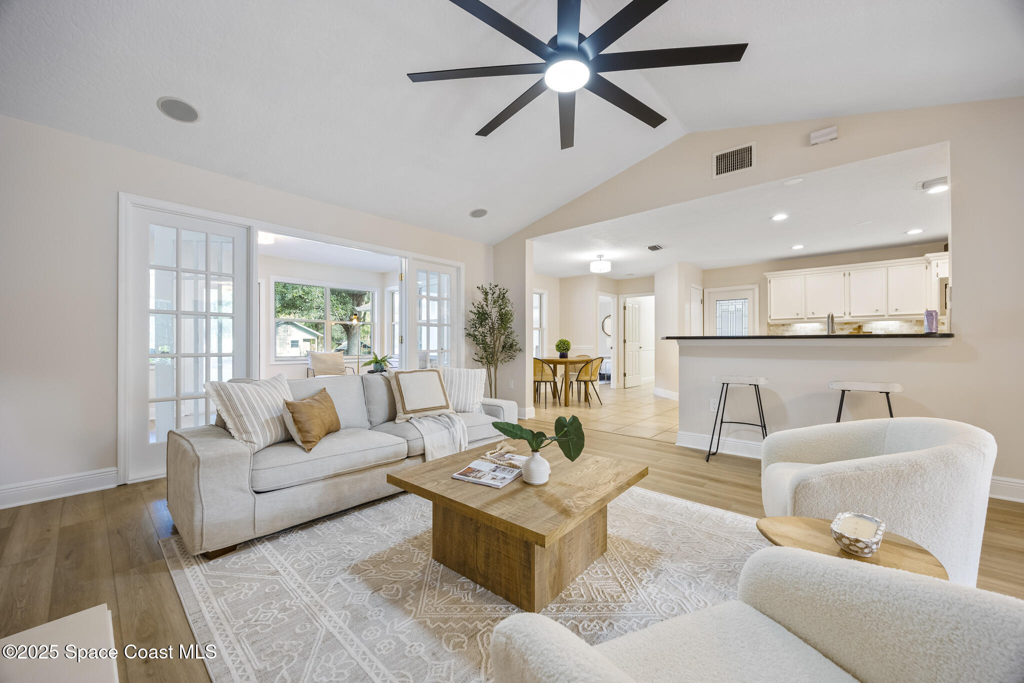 2190 Winston Drive Cocoa, FL 32926 - Photo 10 of 59 a living room with furniture and a large window