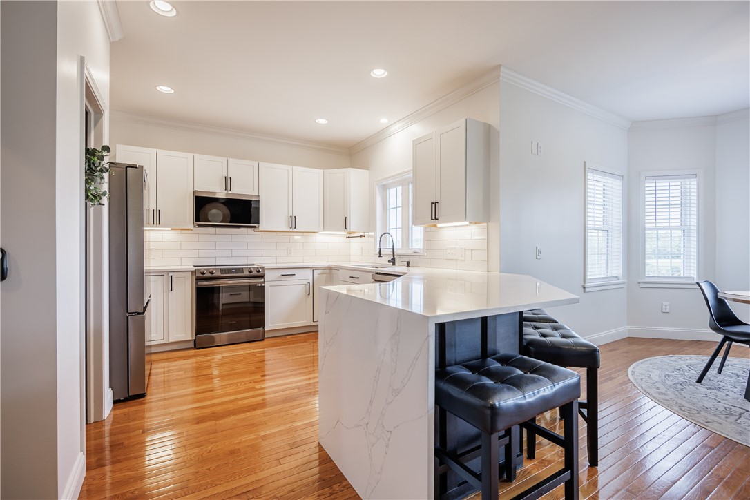 10181 Francis Road Bethany, NY 14020 - Photo 10 of 46 Breakfast Bar w/Quartz Countertop