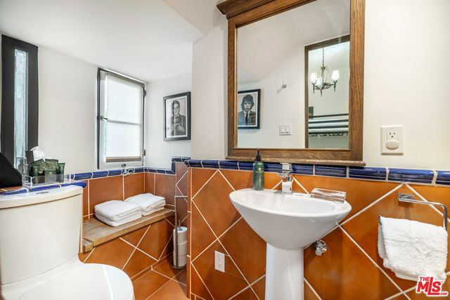 a bathroom with a sink and a shower