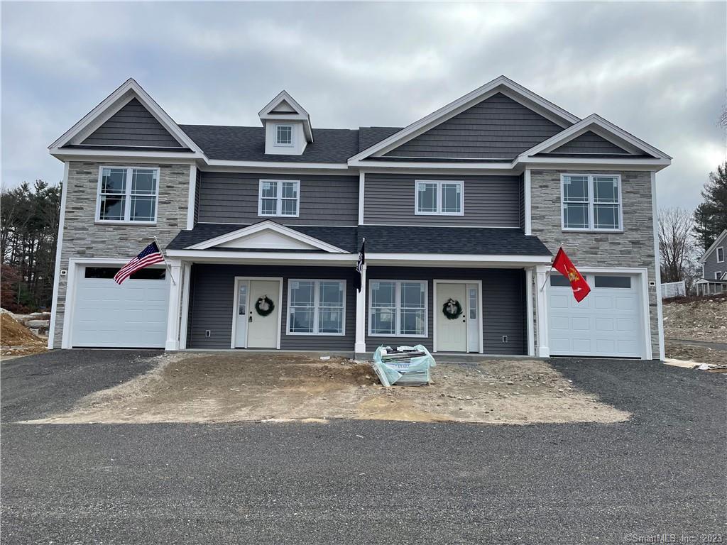 10 Valley View Drive, Unit 10 Danielson, CT 06239 - Photo 1 of 1 a front view of a house with a porch