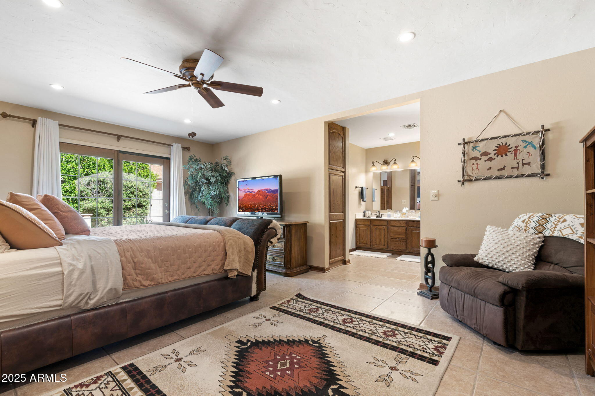 9972 East Del Monte Avenue Gold Canyon, AZ 85118 - Photo 14 of 49 a bedroom with a bed a couch and window