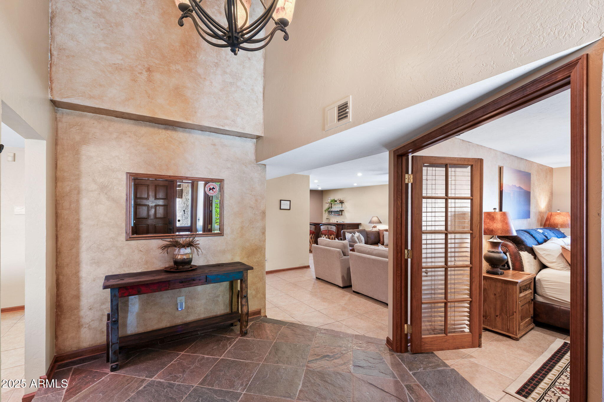 9972 East Del Monte Avenue Gold Canyon, AZ 85118 - Photo 22 of 49 a living room with furniture a rug and white walls